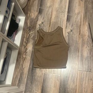 Cute brown tank top. A little bit cropped size small. From hollister.